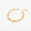 Pulsera en baño de oro floral