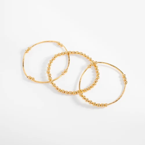 Trío de pulseras en baño de oro